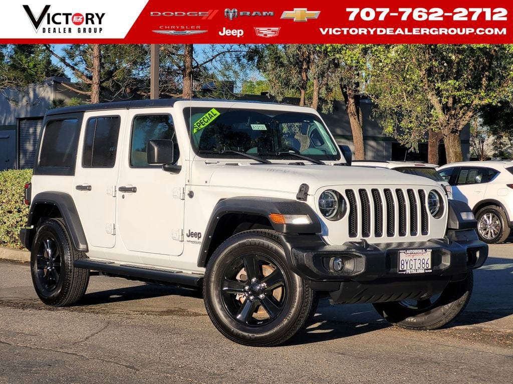 2021 Jeep Wrangler Unlimited Sport Altitude in White — front three-quarter view