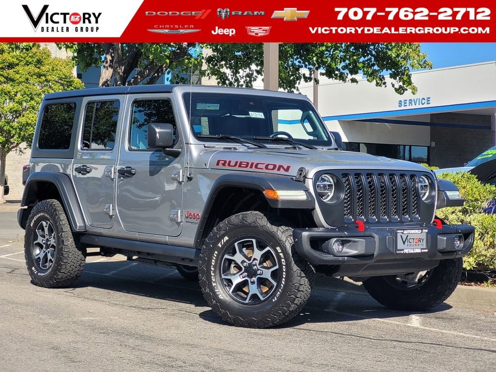 2021 Jeep Wrangler Unlimited Rubicon in Billet Silver Metallic Clearcoat — front three-quarter view