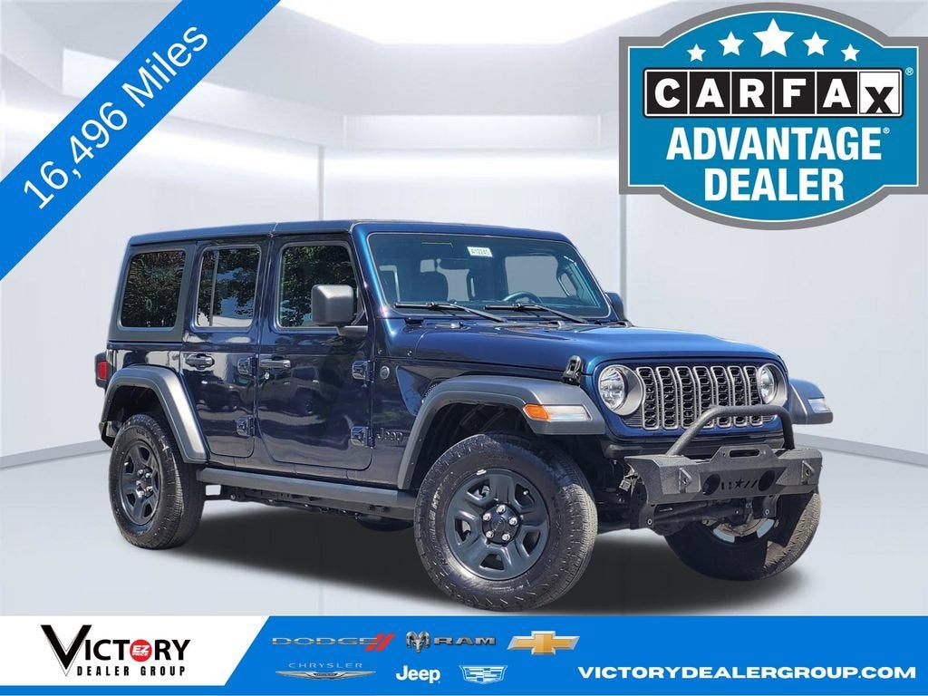2025 Jeep Wrangler Sport in Fathom Blue Pea — front three-quarter view
