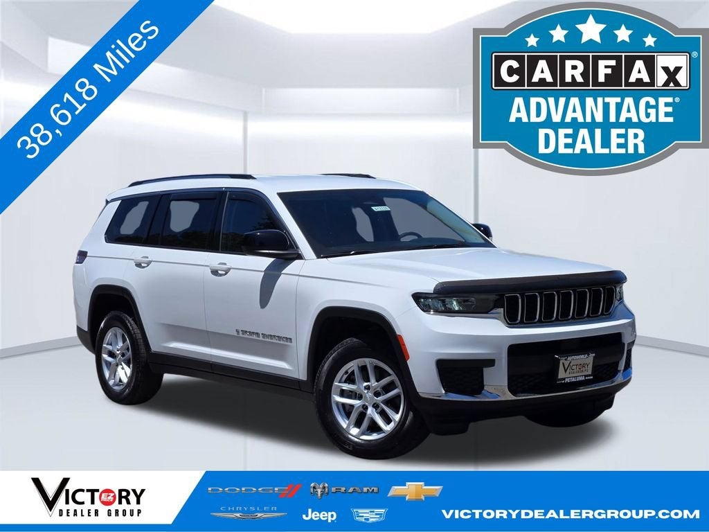 2023 Jeep Grand Cherokee L Laredo in White — front three-quarter view