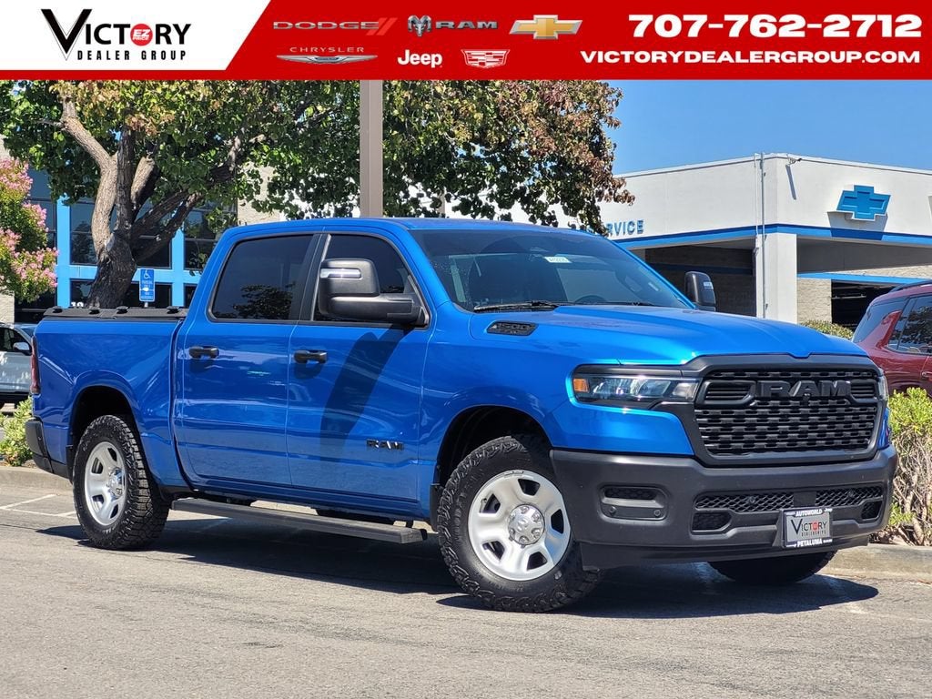 2025 RAM 1500 Tradesman in Hydro Blue Pear — front three-quarter view