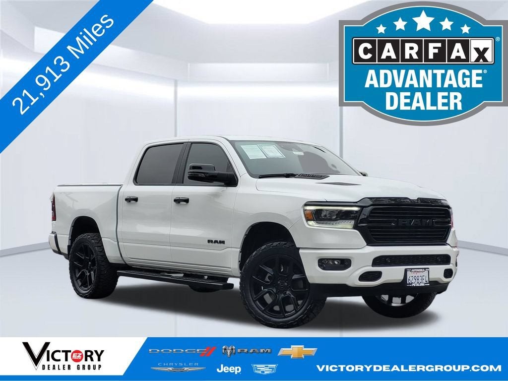 2024 RAM 1500 Laramie in White — front three-quarter view