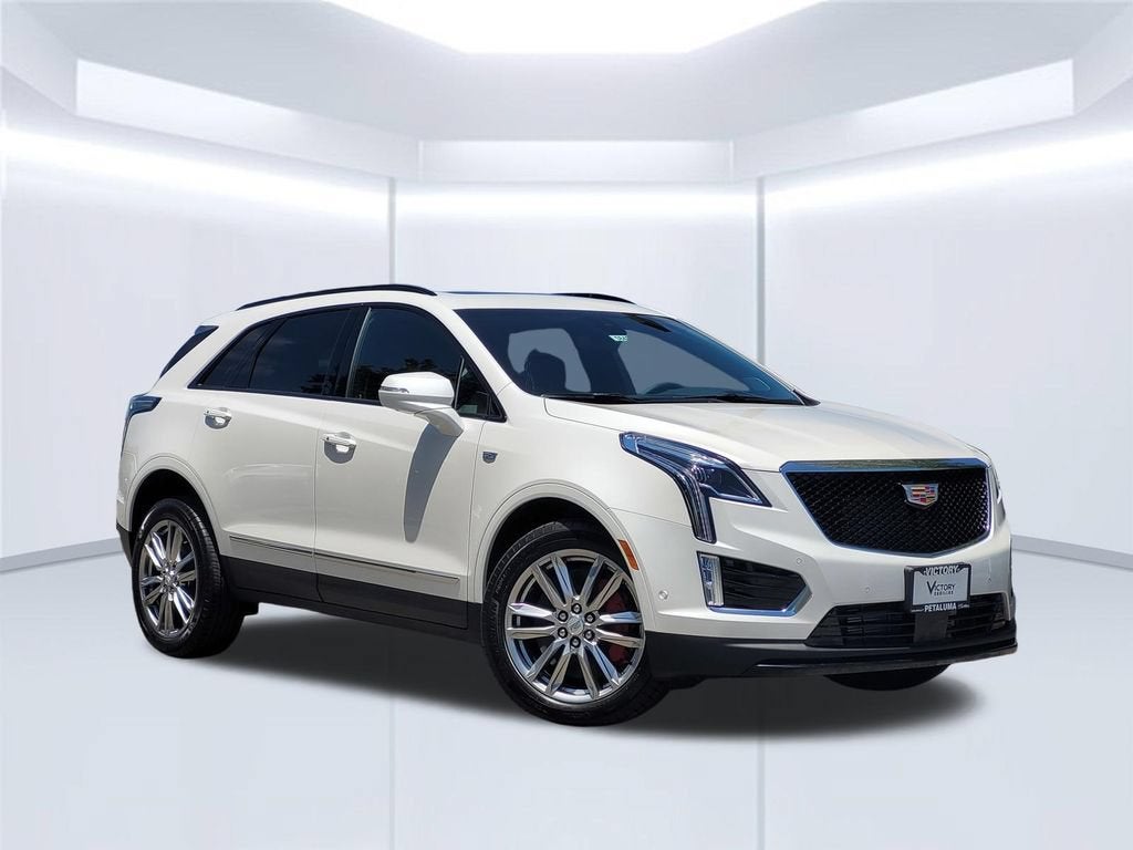 2026 Cadillac XT5 Sport in Crystal White Tricoat — front three-quarter view