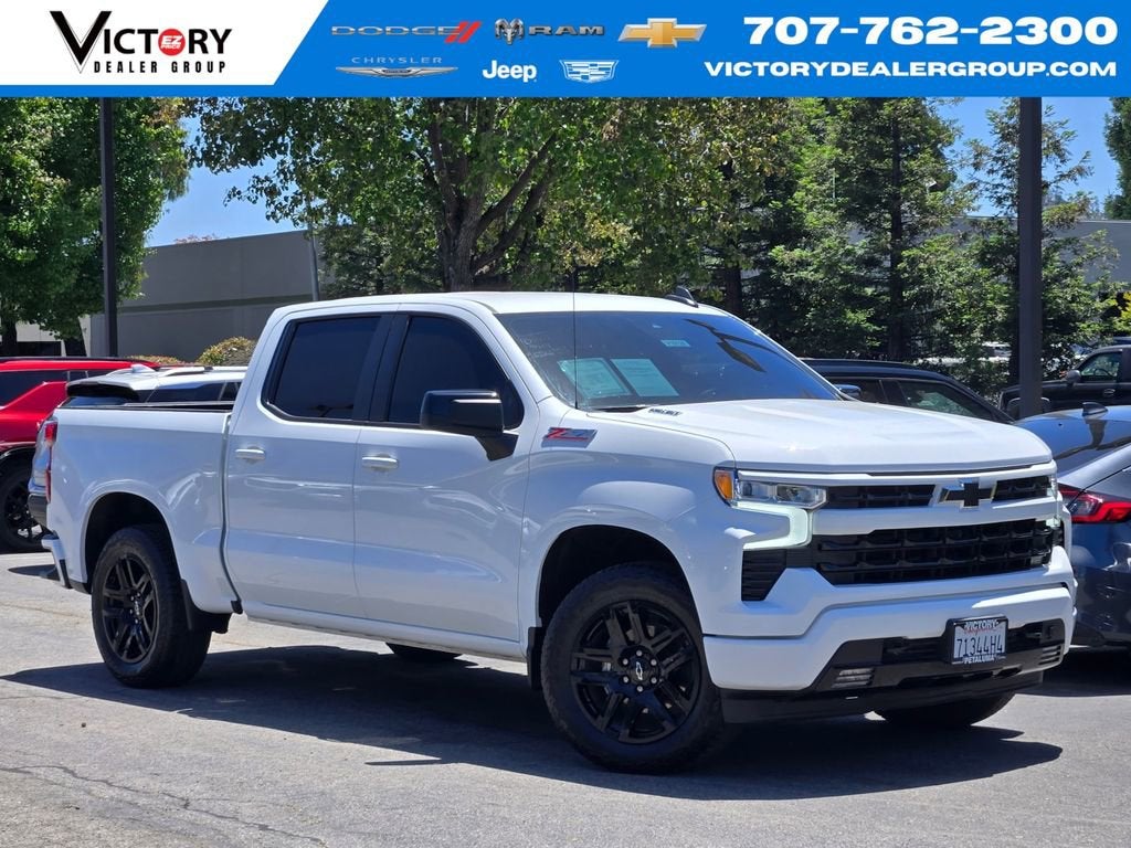 2025 Chevrolet Silverado 1500 RST in Summit White — front three-quarter view